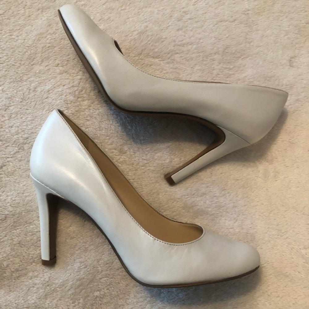 Nine West round toe white pumps